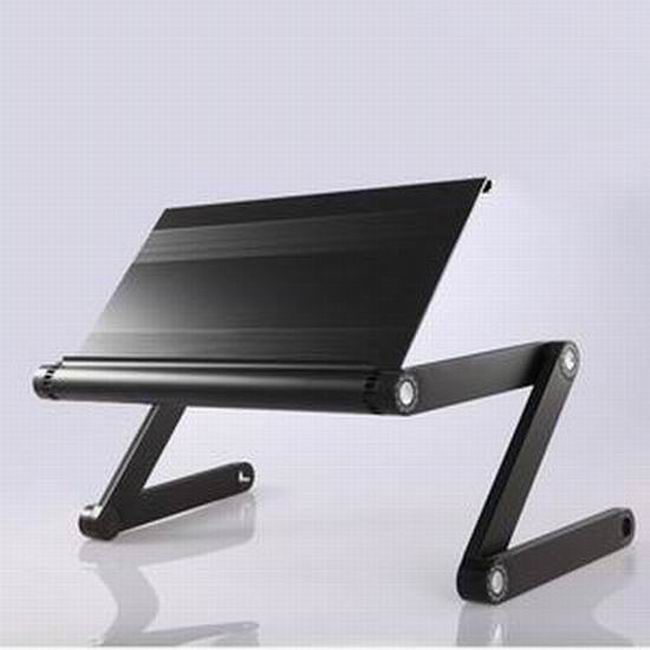 this kind of laptop desk can be used in bed, sofa, on the floor
