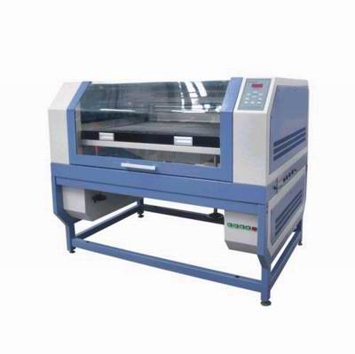 JG-10060 laser embroidery and cutting machine for textile, leather, and rolling material.