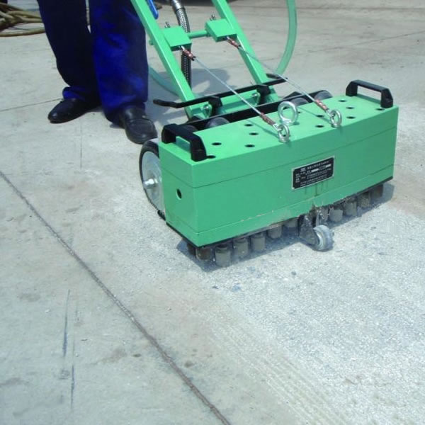 Electric Concrete Scabbler is a machine with high efficiency, long service life ,high hammering frequency and work area,which can chisel the road and eliminate the protruding parts of the ground surface, contribute to the ground turns into  smooth.