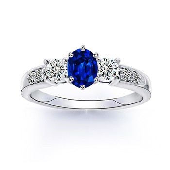 Show off your fashion with a class of elegance! Perched in 14K white gold, this blue sapphire centered diamond encrusted ring is an epitome of luxury and style.