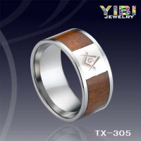 Tungsten ring with KOA wood and Silver with laser engraved in the middle