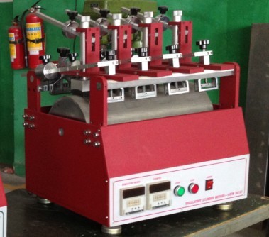 Oscillatory abrasion testing machine